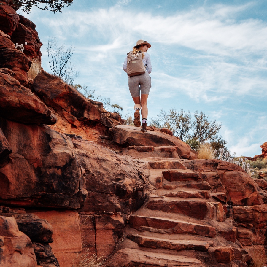 Lady walking up heartbreak hill at the start of the kings canyon walk