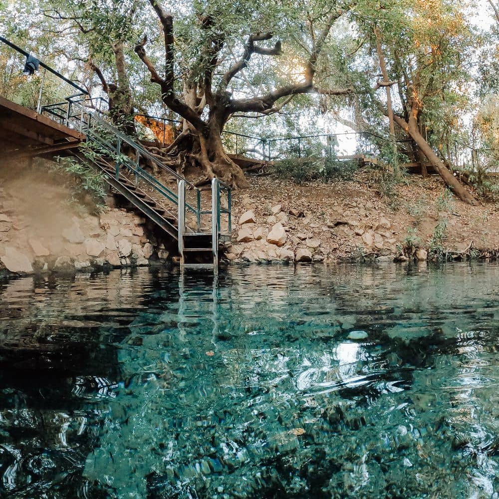 Stairs leading down to crystal clear waters of Katherine Hot Springs. Most say Katherine Hot Springs are forgettable, and able to energize both your mind and soul.