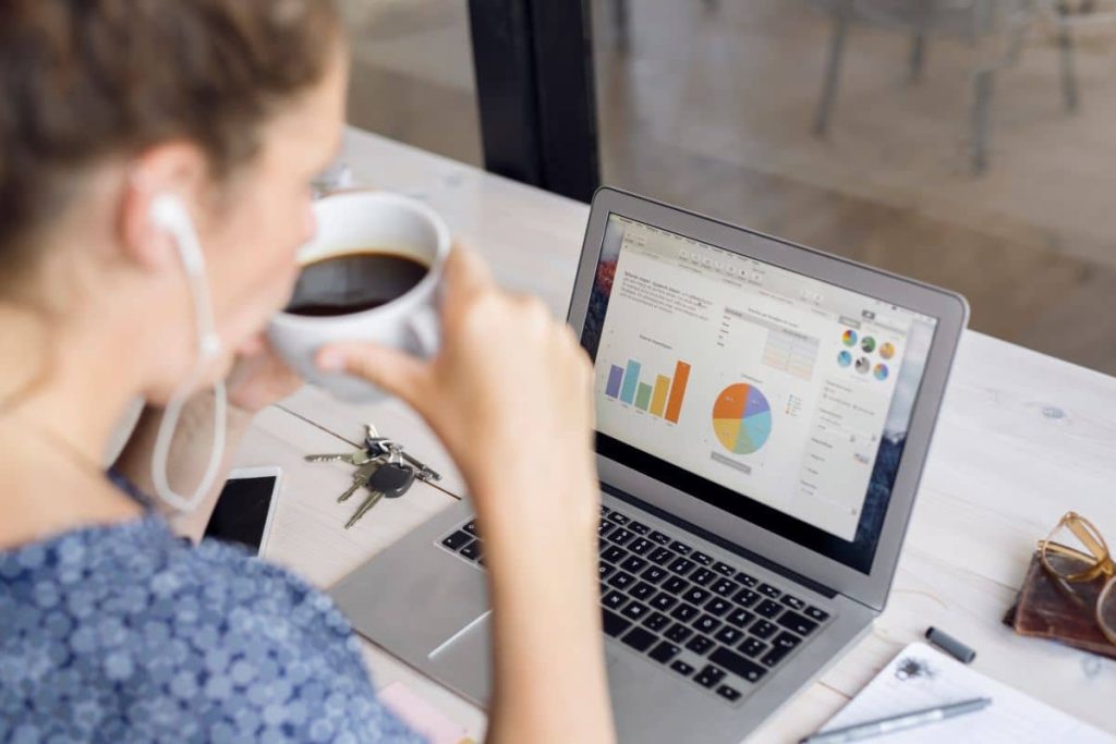 Female worker researching online work statistics