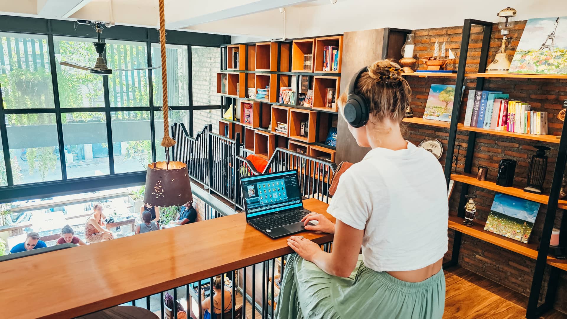 Bec from Salt and Charcoal working online in a cafe
