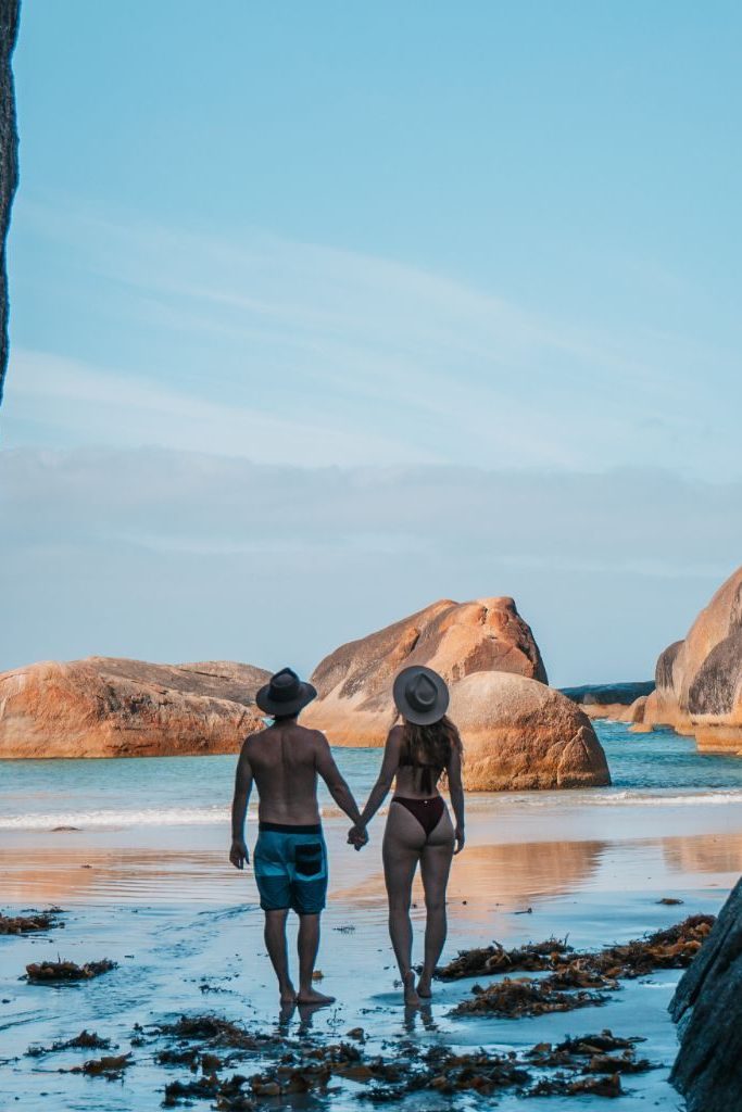 Chris and Bec walking towards Elephant Rocks in Denmark, WA