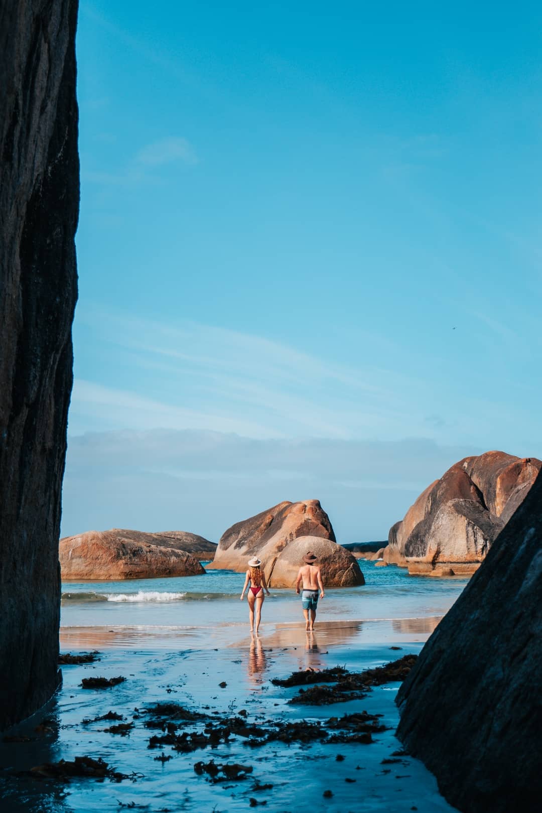 couple walking to the beach in Elephant Rocks Denmark Western Australia
