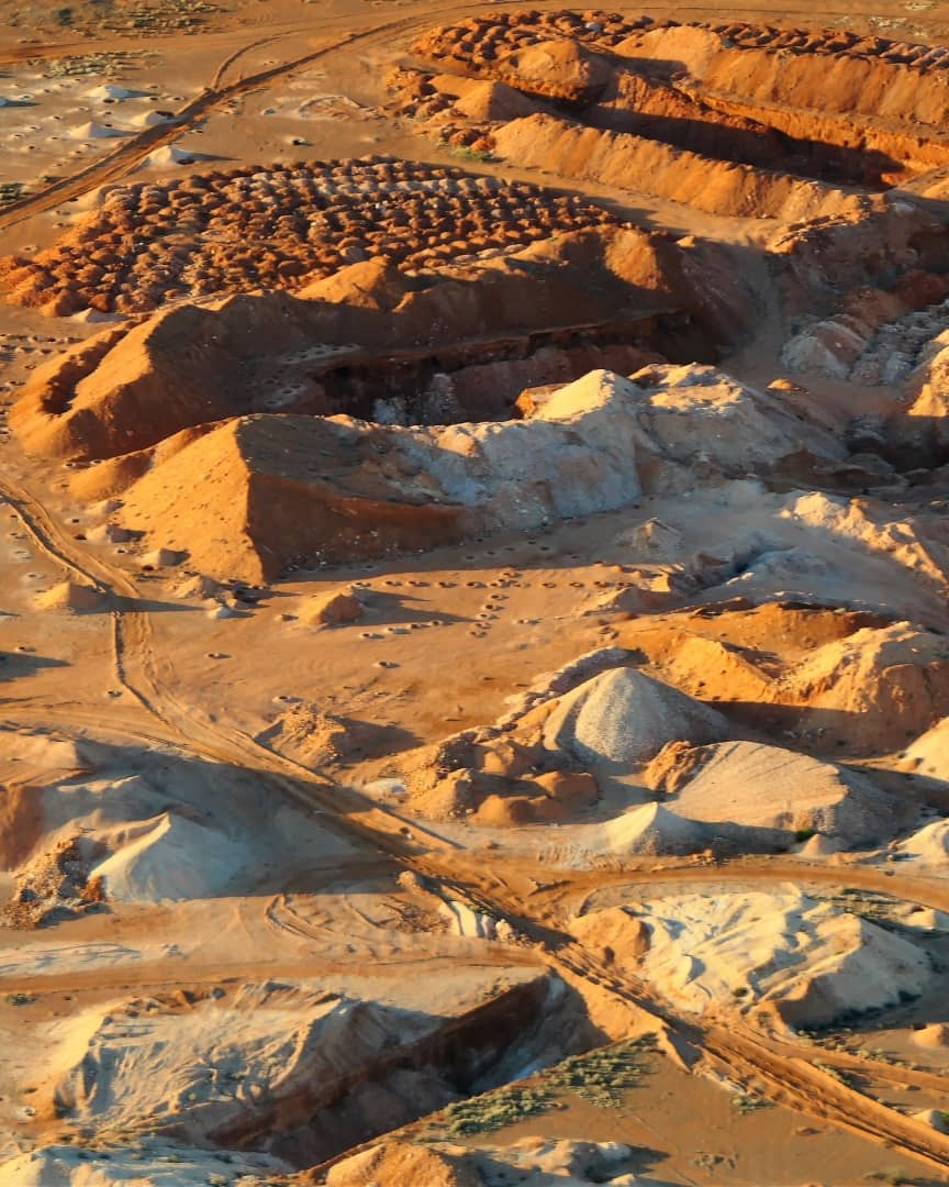 Aerial view of an opal mine in Coober Pedy, South Australia. Discover where to finds opals in Australia by visiting Coober Pedy.