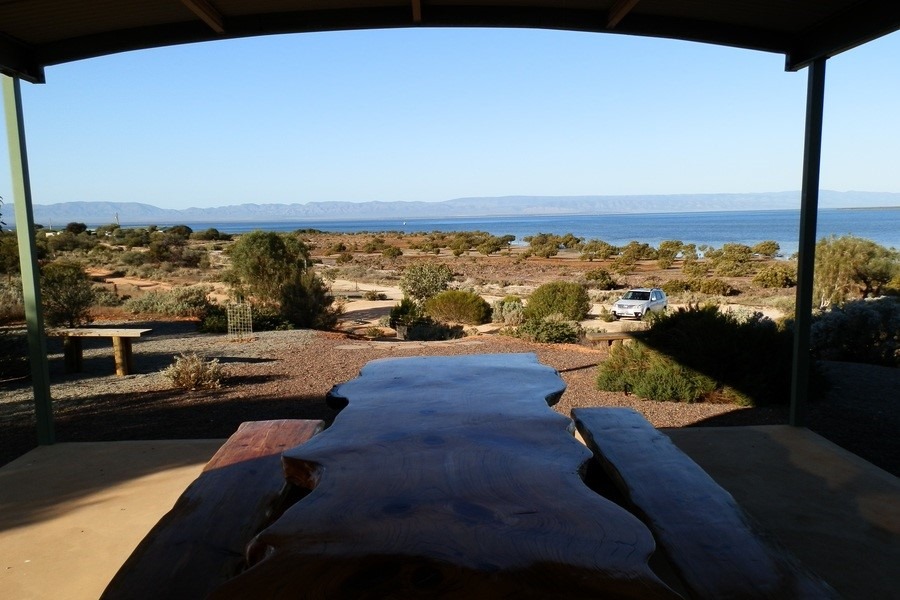View of Spencer Gulf and the Flinders Ranges from a picnic area at Blanche Harbour in Port Augusta. Discover things to do in Port Augusta, such as enjoying a picnic with scenic views.