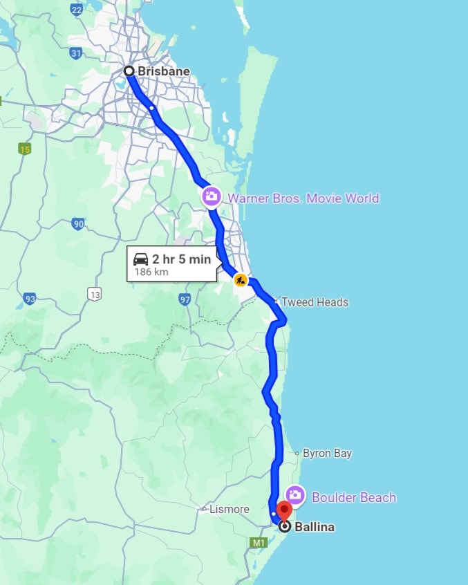 A map showing a driving route from Brisbane to Ballina, covering a distance of 186 kilometers with an estimated travel time of 2 hours and 5 minutes. The route passes notable points such as Warner Bros. Movie World and areas near Tweed Heads and Byron Bay.