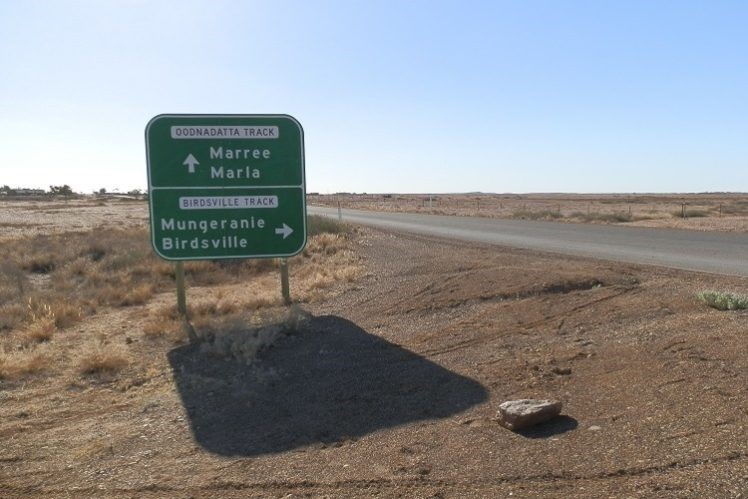 A road sign at the junction of Oodnadatta and Birdsville Tracks near Marree—an iconic stop for outback travelers in Copley, SA.