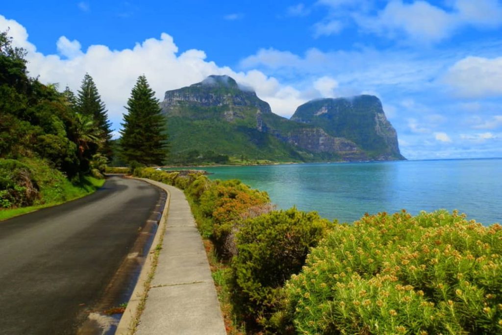 A scenic view of Mount Gower and Mount Lidgbird on Lord Howe Island, NSW, Australia, captured after a rain shower.