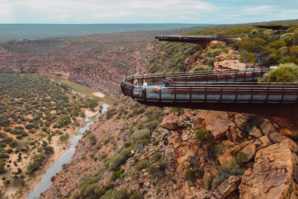 Elevated metal skywalk extending over the Murchison Gorge in Kalbarri, Western Australia. Kalbarri is famous for the flies buzzing around you at all times - the ultimate Australian pest