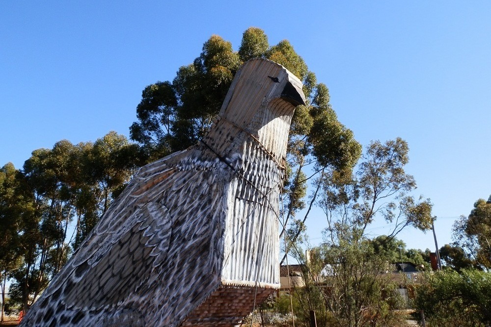 Big Mallee Fowl sculpture made from metal with trees in the background.