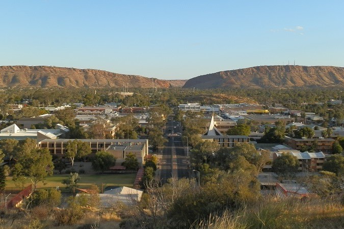 View of Alice Springs with Heavitree Gap in the background, a key attraction for things to do in Central Australia.