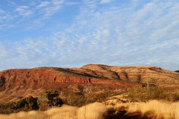 Rugged terrain of Mt Nameless, a top attraction among things to do in Tom Price, known for its panoramic views.
