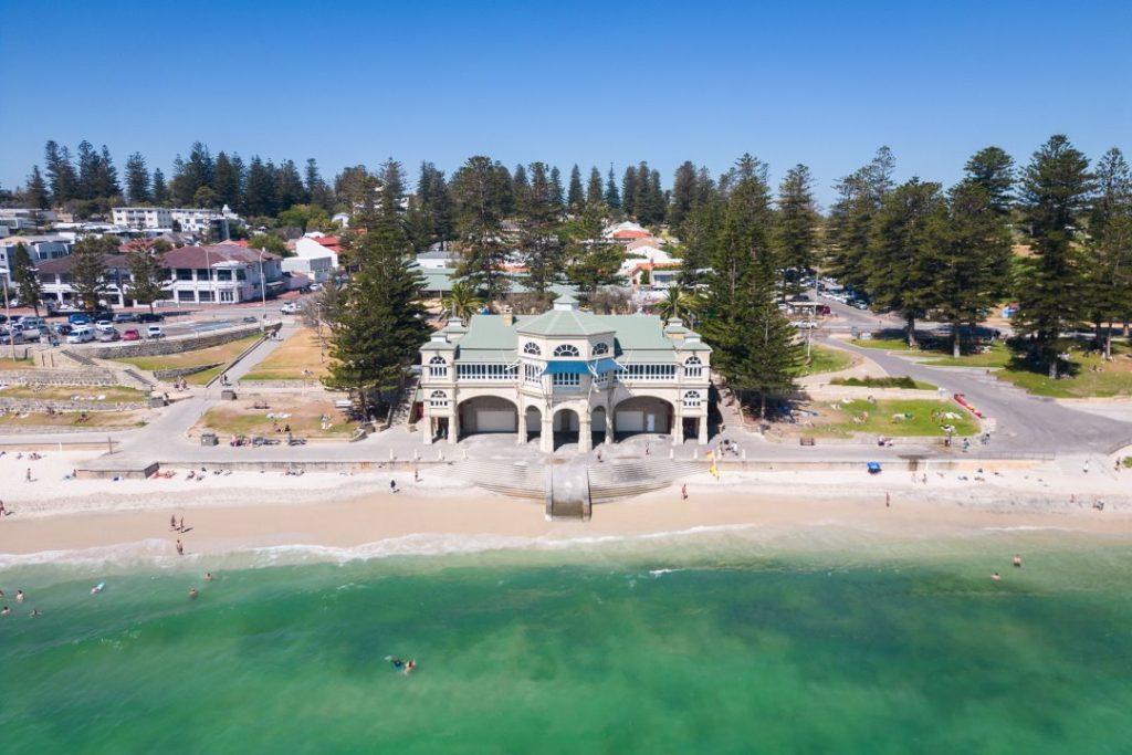 The iconic pavilion at Cottesloe Beach with its sandy shoreline and clear green waters.