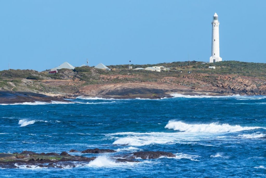 Cape Leeuwin Lighthouse overlooking the rugged coastline of Western Australia.