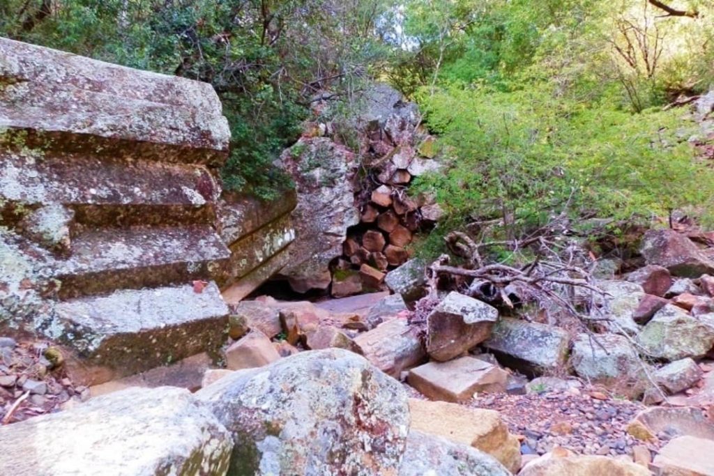 Fallen basalt columns scattered at Sawn Rocks in Mt Kaputar National Park, showcasing nature's impressive geological formations.