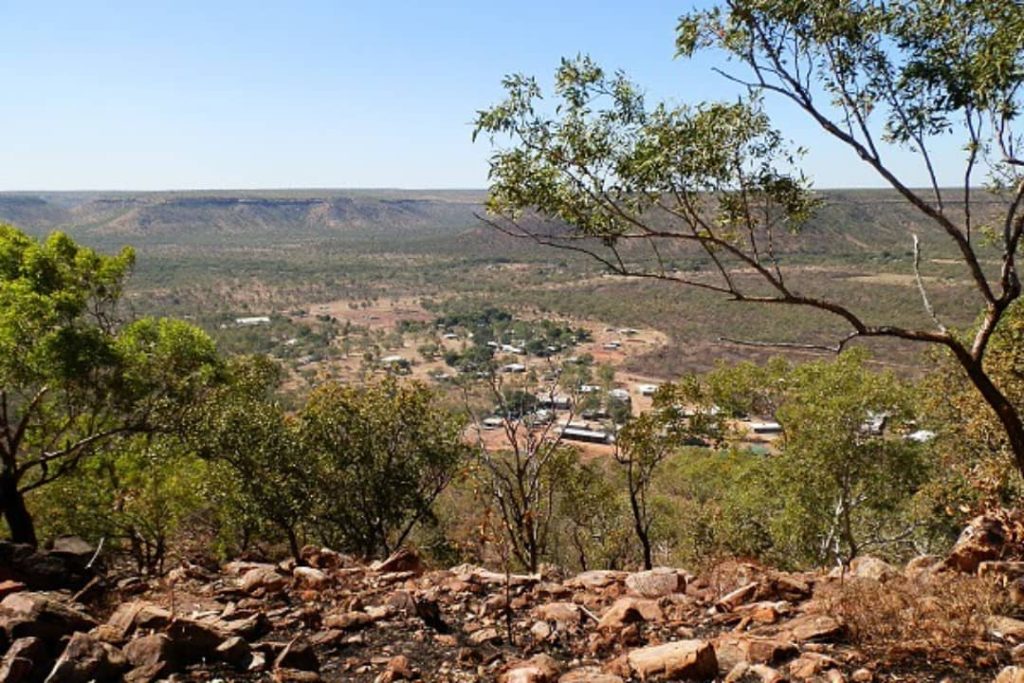 View of Timber Creek township from the Escarpment Lookout in Northern Territory, surrounded by rugged outback landscape.