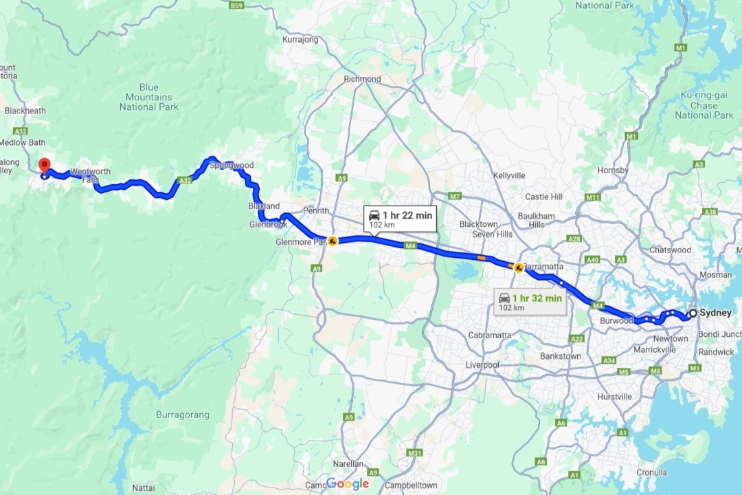 A map showing the driving route from Sydney to Wentworth Falls in the Blue Mountains National Park, with a distance of approximately 102 kilometers. The estimated travel time is 1 hour and 22 minutes.