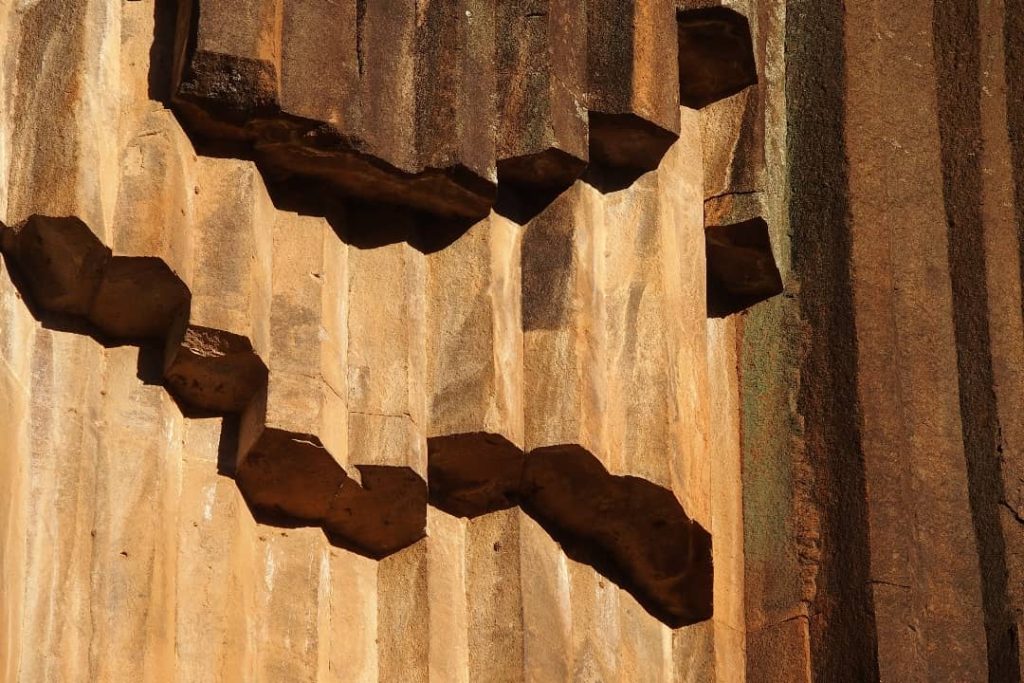 Close-up of hexagonal rock formations at Sawn Rocks in Mt Kaputar National Park, showcasing the unique columnar structure of the basalt.
