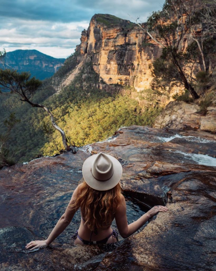 A tranquil infinity pool at the top of Fortress Falls, with panoramic views of the Blue Mountains. It might be a very cold plunge in winter, but worth it!