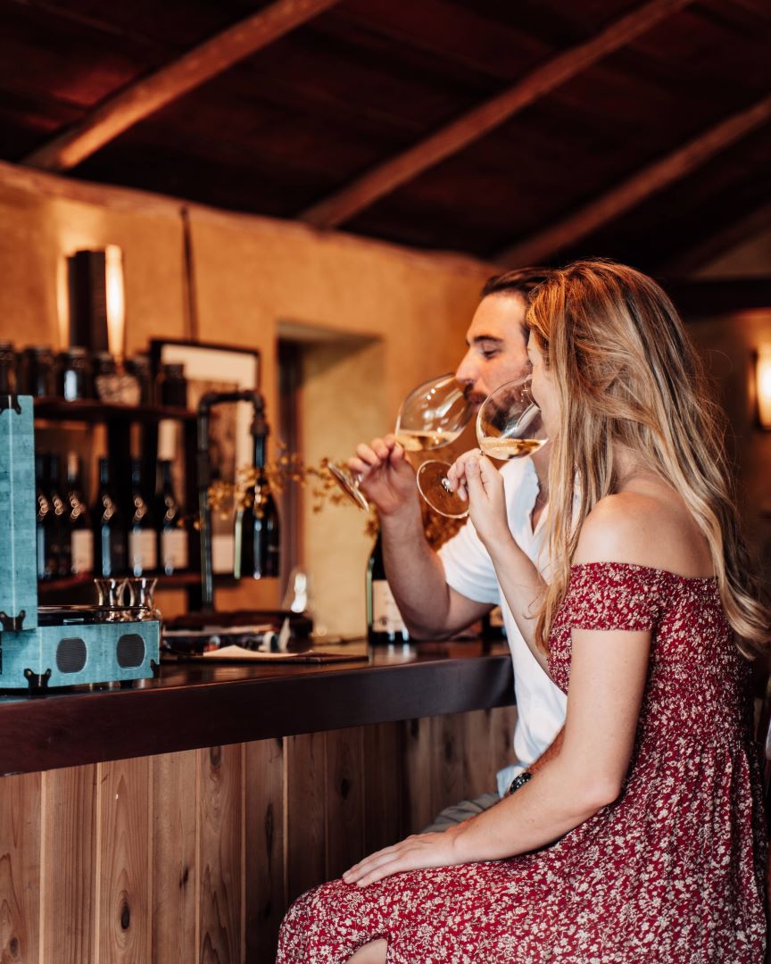 Young couple doing a wine tasting tour, an epic activity to do in Albany, WA